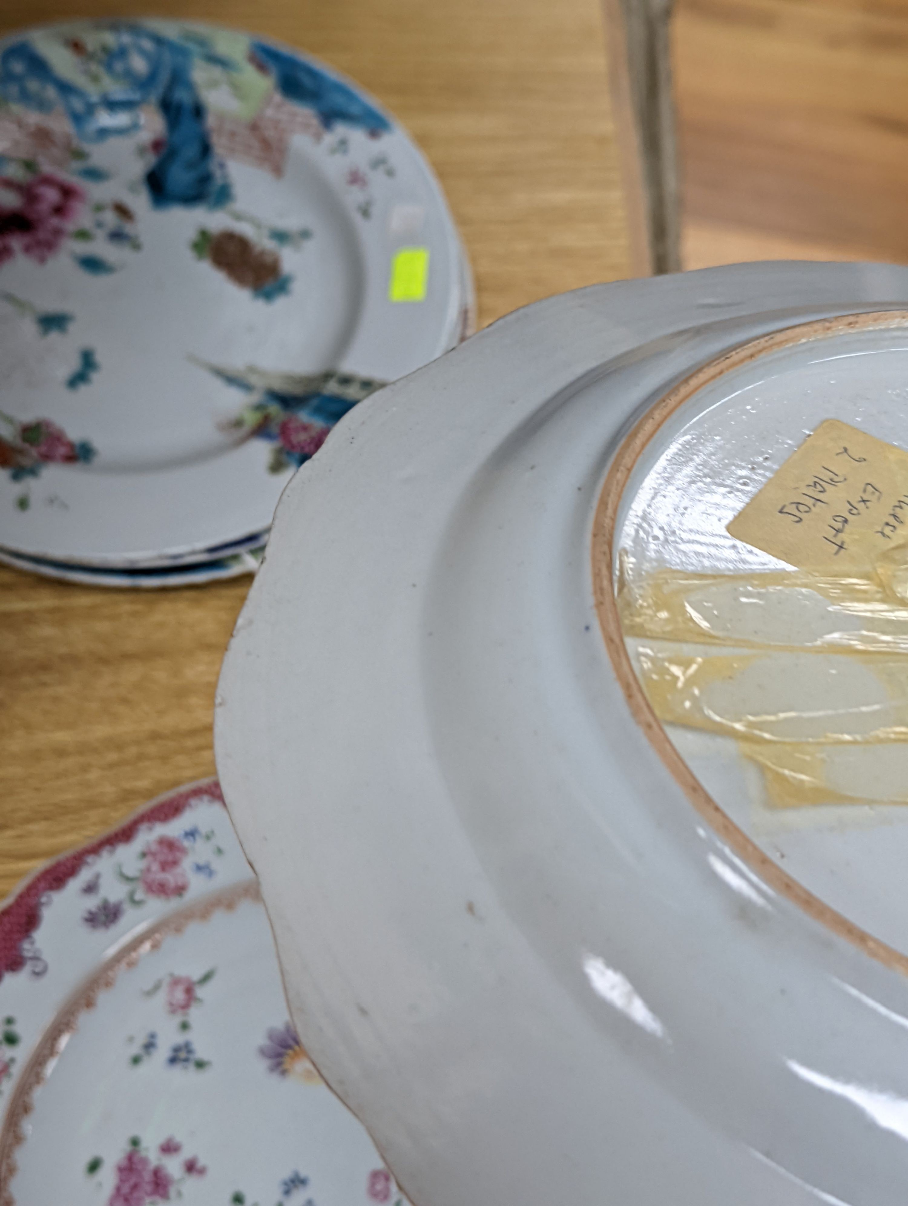 Two pairs of 18th century Chinese famille rose plates and an Imari plate, 26cm